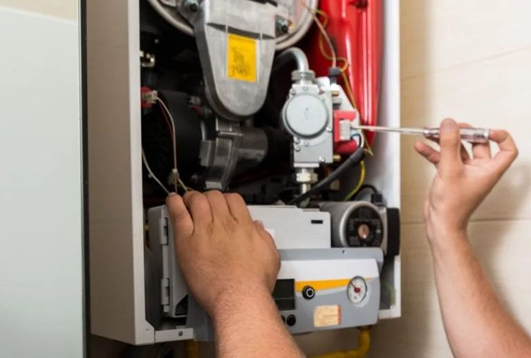 Residential furnace showing internal safety components, illustrating why you cannot run a furnace without a limit switch