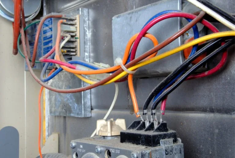 Residential furnace system in a utility room, illustrating common furnace repair issues such as furnace not heating, fur