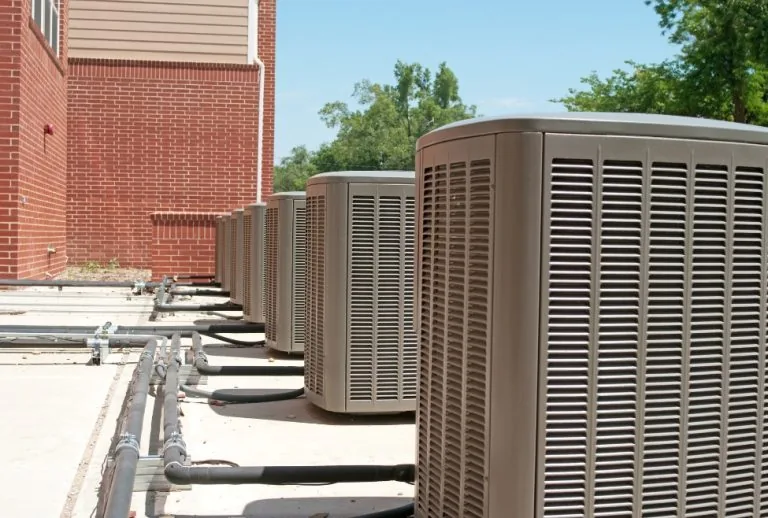 Air conditioning system showing repair vs replacement decision, illustrating is it cheaper to repair or replace an AC, i
