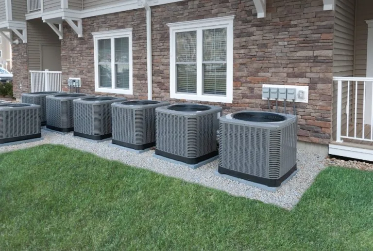 Outdoor air conditioning condenser unit illustrating what is the AC condenser, including heat transfer process, AC cooli